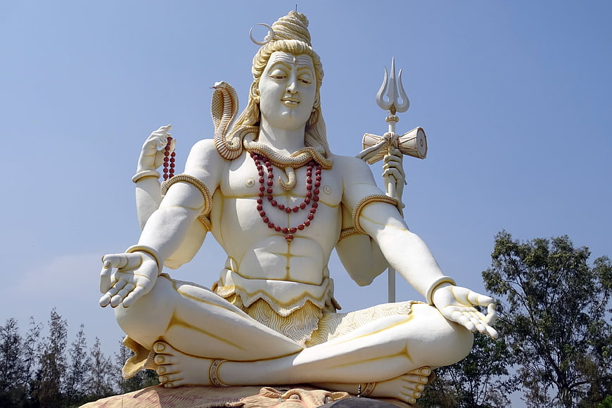 White Statue of Lord Shiva Meditating with Trishul
