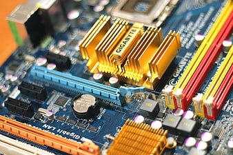 Close-up of Gigabyte computer motherboard with gold heatsink