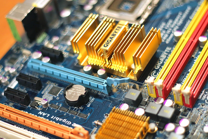 Close-up of Gigabyte computer motherboard with gold heatsink