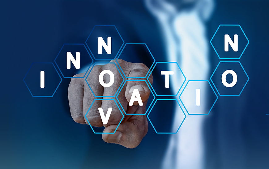 Hand touching innovation hexagon interface