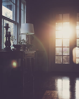 Sunlit Interior Room with Vintage Furniture and Lens Flare