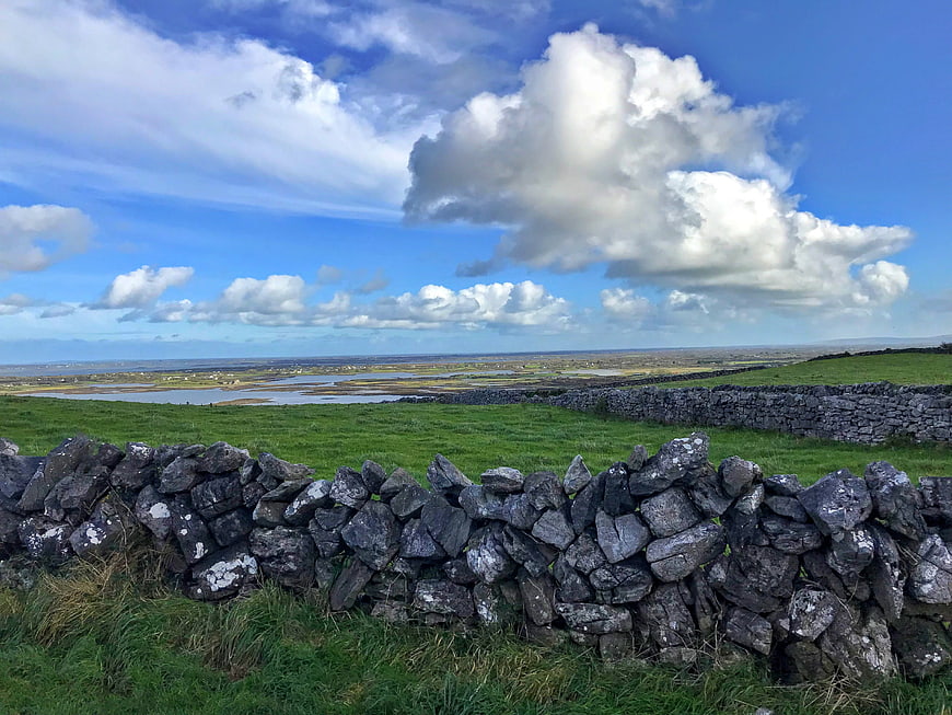 Rural Irish Landscape with Dry Stone Wall and Blue Sky