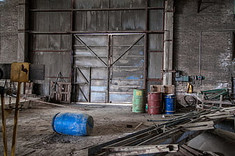 Interior of an Abandoned Industrial Factory with Rusty Metal Doors