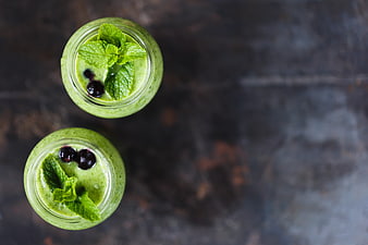 Top View of Green Smoothies with Mint and Blueberries