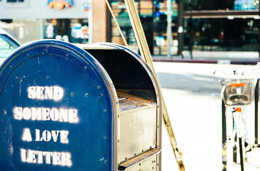 Blue Mailbox with Send Someone a Love Letter Text