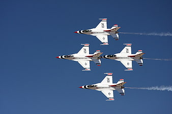 Four USAF Thunderbirds Jets Flying in Diamond Formation