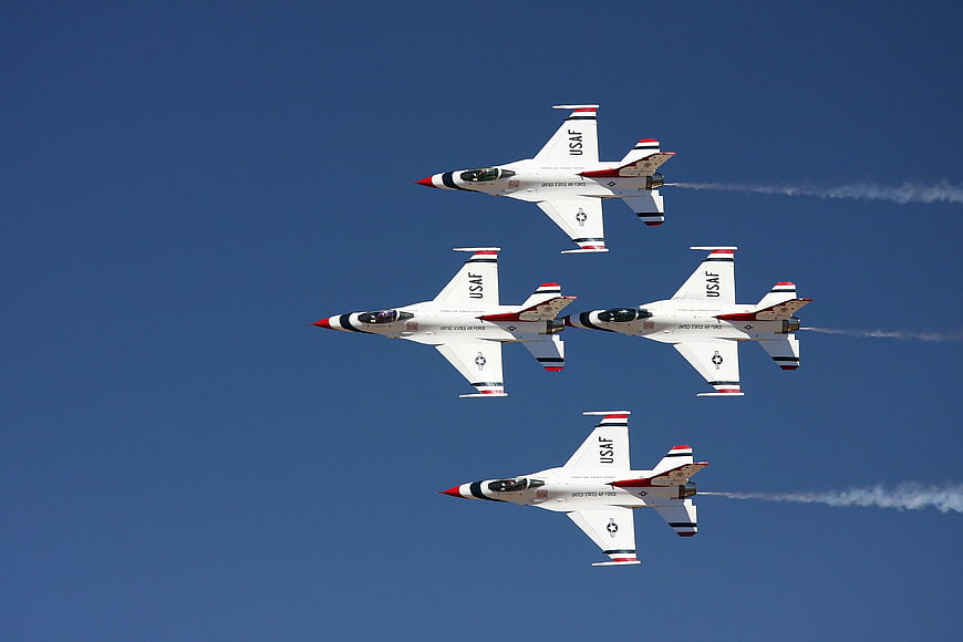 Four USAF Thunderbirds Jets Flying in Diamond Formation