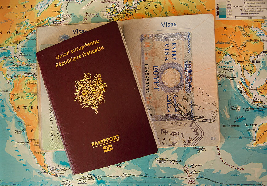 French Passport and Visa on World Map