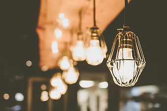 Vintage Industrial Light Bulbs Hanging in Restaurant