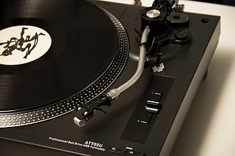 Close-up of Professional Belt Drive USB Turntable with Vinyl Record