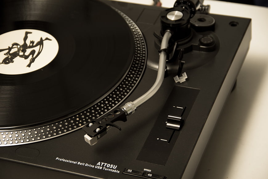 Close-up of Professional Belt Drive USB Turntable with Vinyl Record