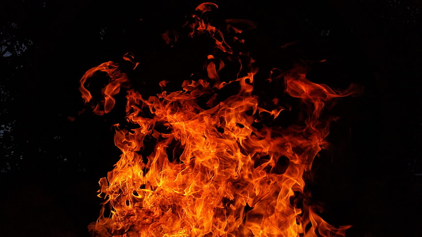 Intense Orange Flames Burning Against Black Background