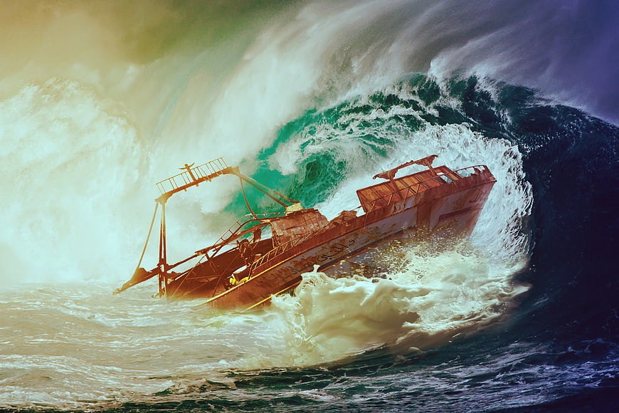 Dramatic shipwreck capsizing in massive ocean wave