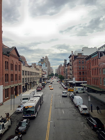 Urban Street Scene with Traffic and Brick Buildings