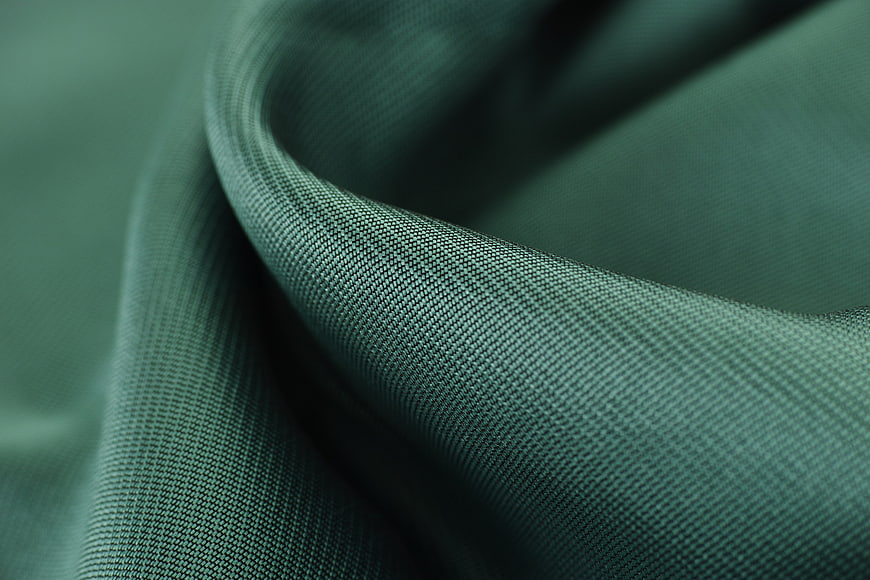 Macro Close-Up Of Green Woven Cotton Fabric Texture