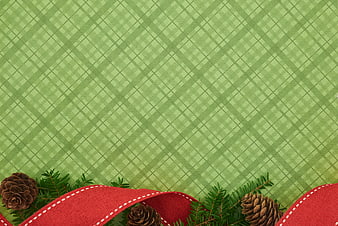Green Plaid Christmas Background with Pine Cones and Red Ribbon