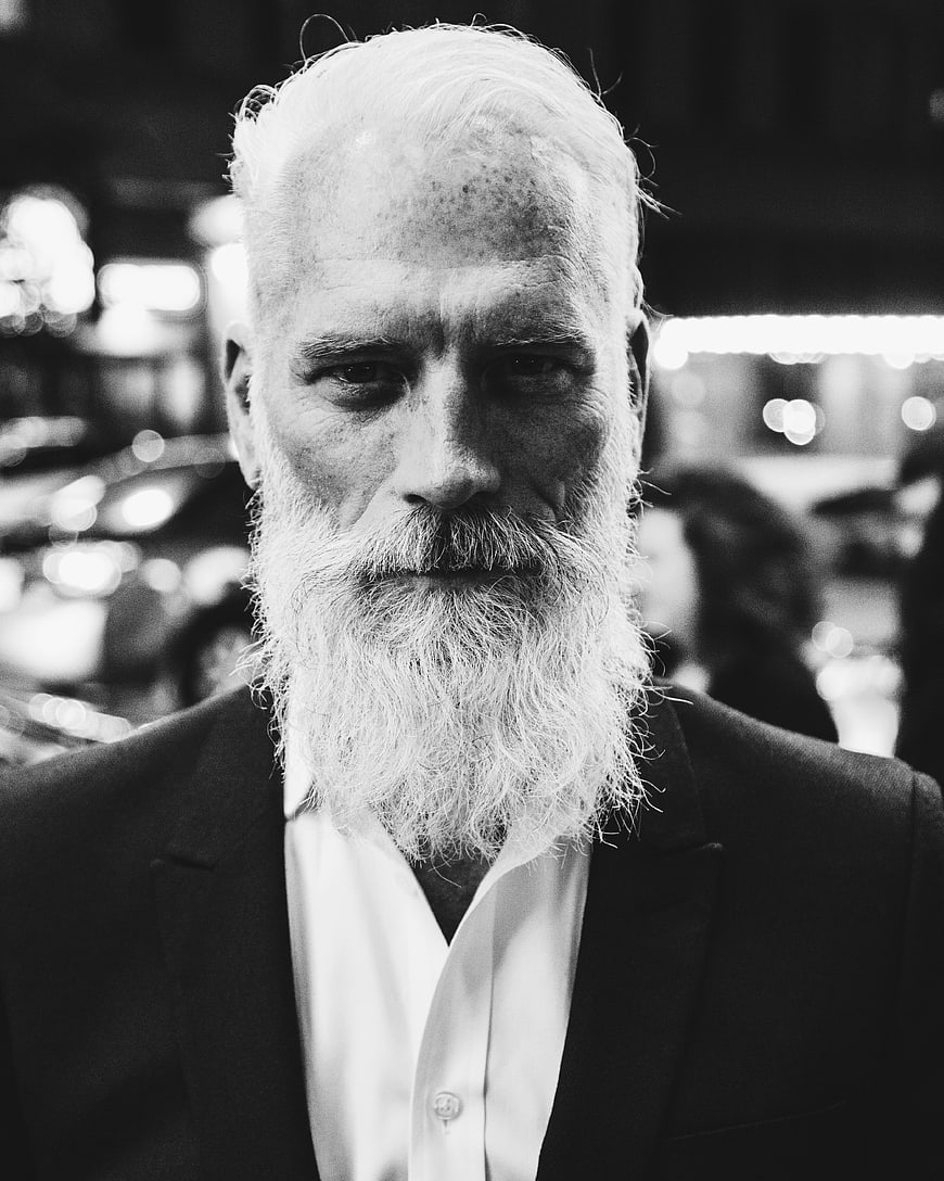 Portrait of Senior Man with White Beard in Suit