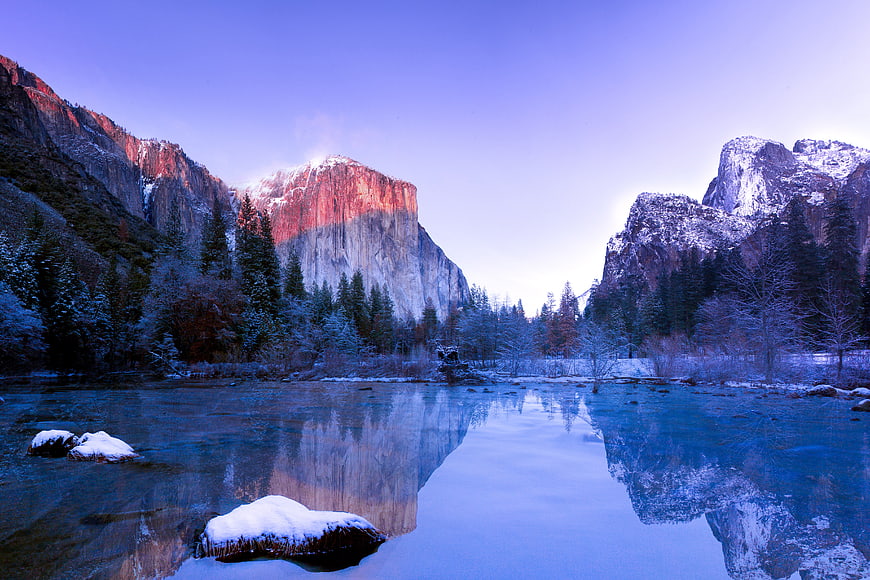 Winter Sunrise at Yosemite Valley with Snow-Capped Granite Cliffs