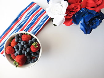 Patriotic Red White Blue Berries and Flowers Flat Lay