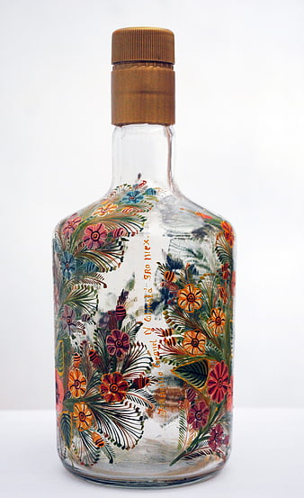 Hand-painted glass bottle with floral design and bees
