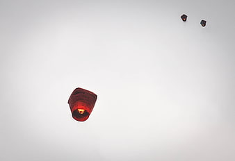 Red Sky Lanterns Floating in White Sky
