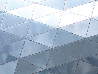 Abstract Geometric Glass Facade with Diagonal Metal Grid