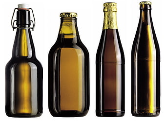 Four different brown glass beer bottles on white background