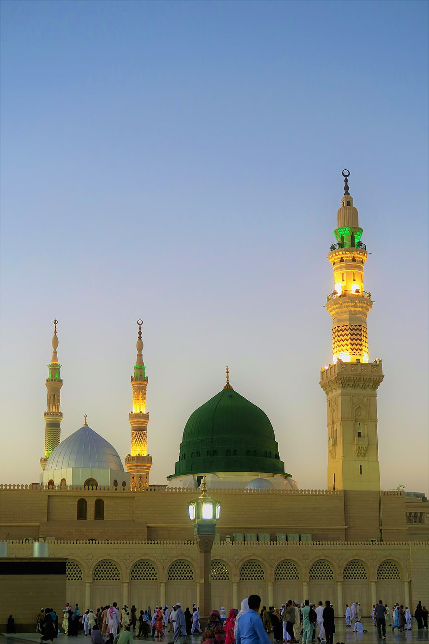 Prophet's Mosque Medina at Dusk with Green Dome and Minarets
