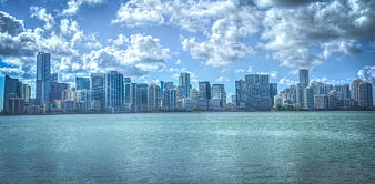 Miami Skyline Panorama Across Water with Blue Sky
