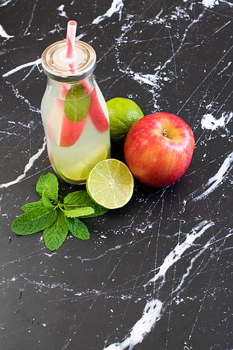 Fresh Apple Lime Mint Detox Drink on Black Marble
