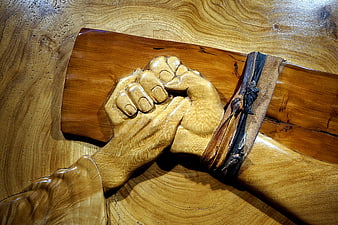 Wooden Carving of Clasped Hands in Prayer