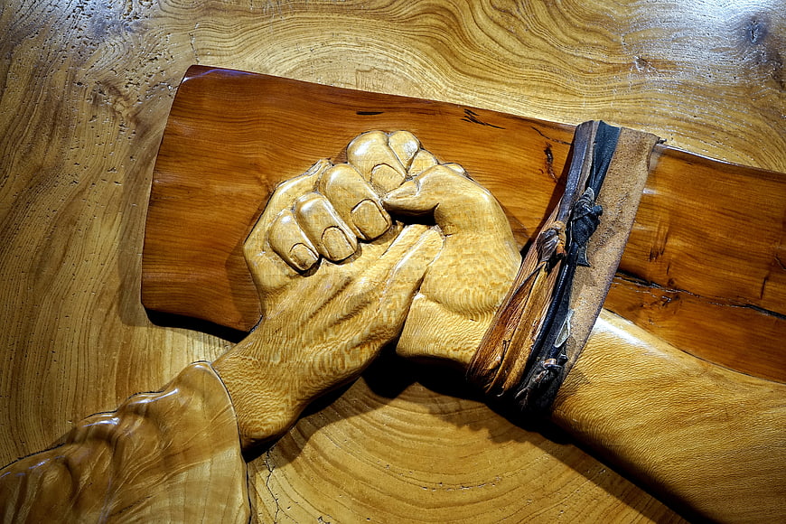 Wooden Carving of Clasped Hands in Prayer