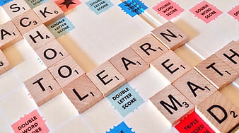 Scrabble Tiles Spelling Learn Math on Game Board