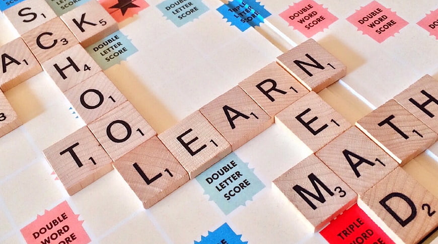 Scrabble Tiles Spelling Learn Math on Game Board