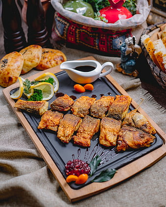 Grilled fish platter with lemon and pomegranate sauce