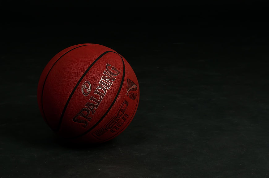 Red Spalding Basketball on Dark Background