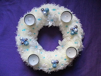 White Advent Wreath With Candles And Blue Ornaments