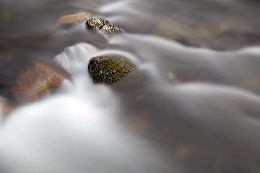 Long Exposure Mossy Rocks in Flowing Stream