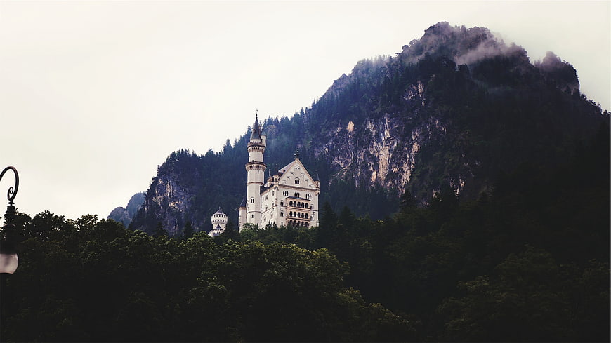 Neuschwanstein Castle in Bavarian Alps Misty Mountains