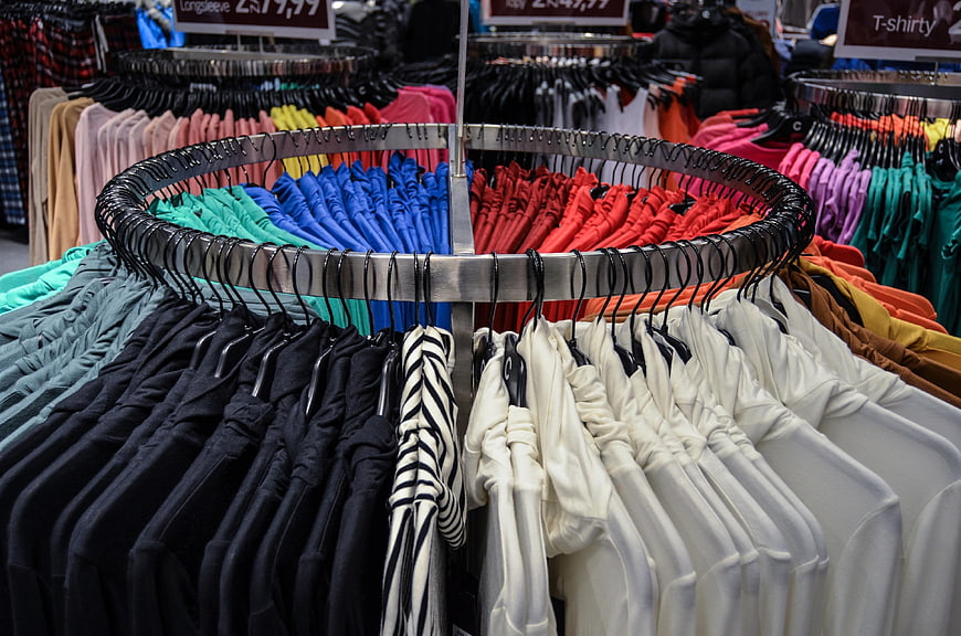 Colorful Clothing Racks in Retail Store