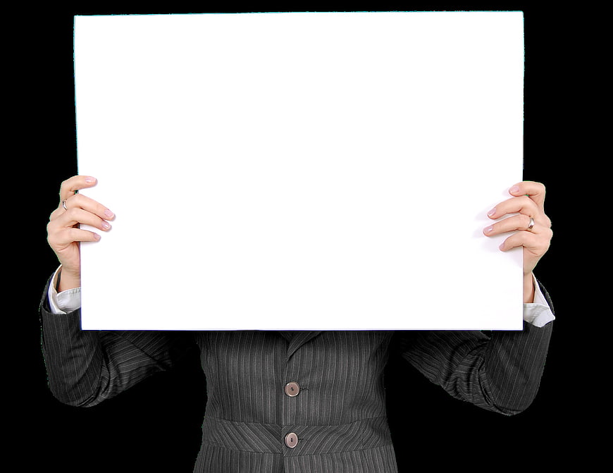 Businesswoman Holding Blank White Sign Board Against Black Background