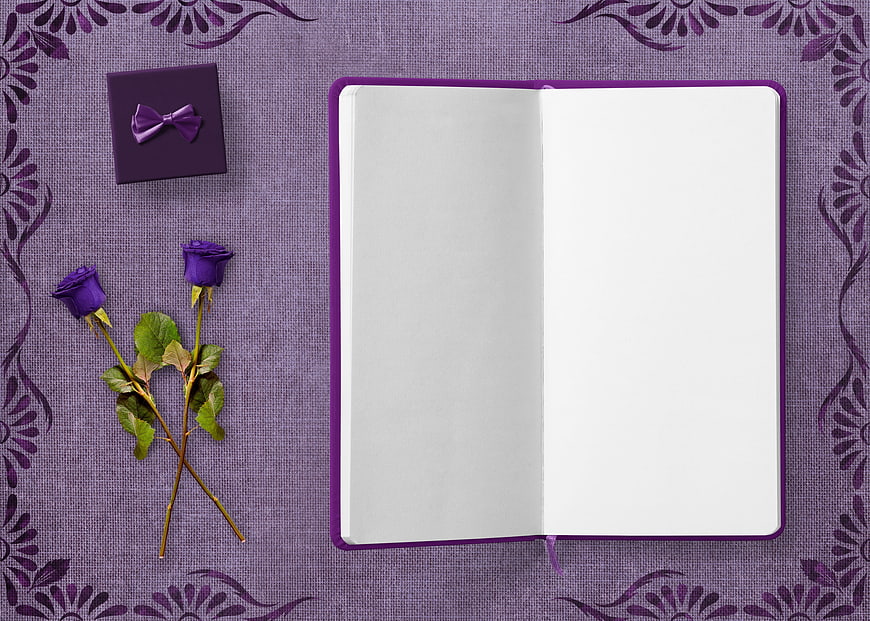 Purple Notebook with Roses and Gift Box on Floral Background