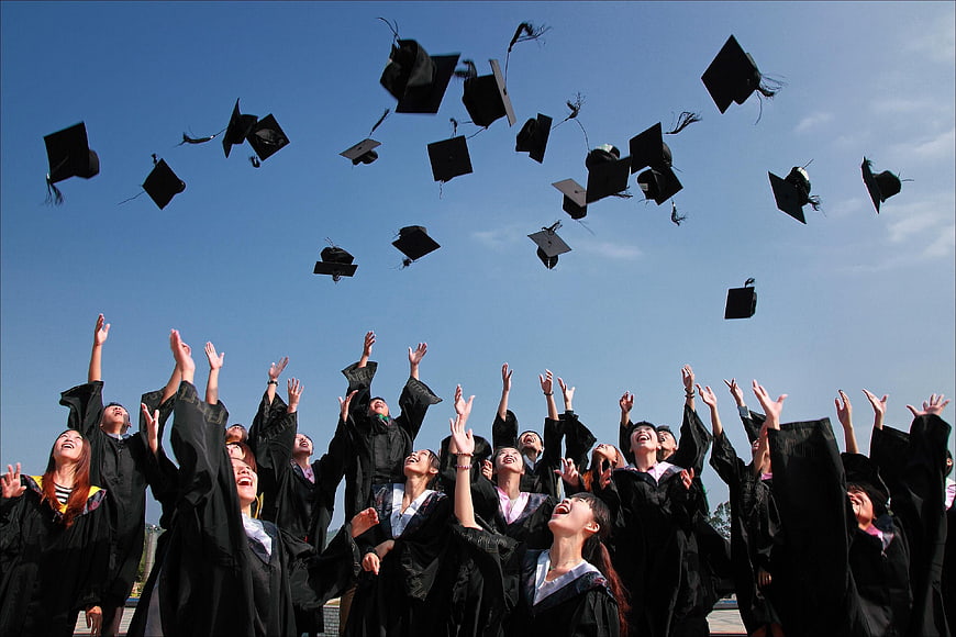 Graduates Throwing Caps in the Air