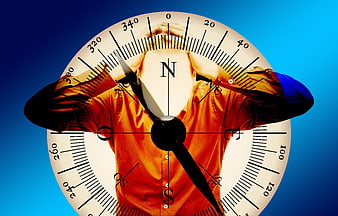 Conceptual double exposure of man and compass symbolizing confusion
