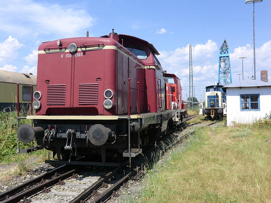 Red V100 Diesel Locomotive on Railway Tracks