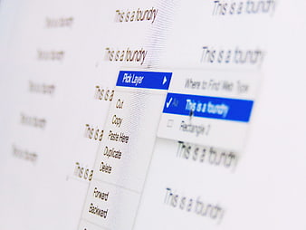 Close-up of graphic design software interface with text layers