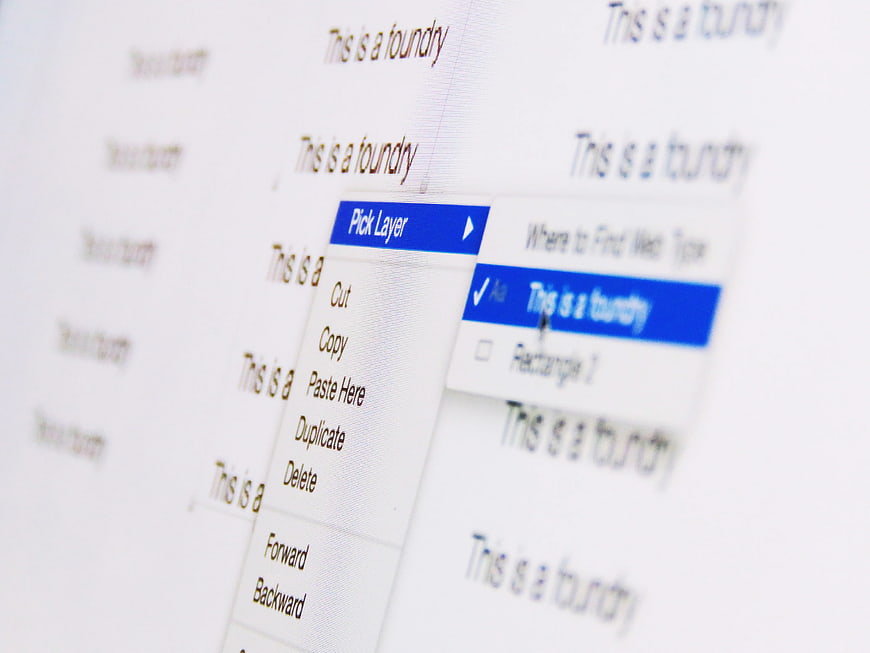 Close-up of graphic design software interface with text layers