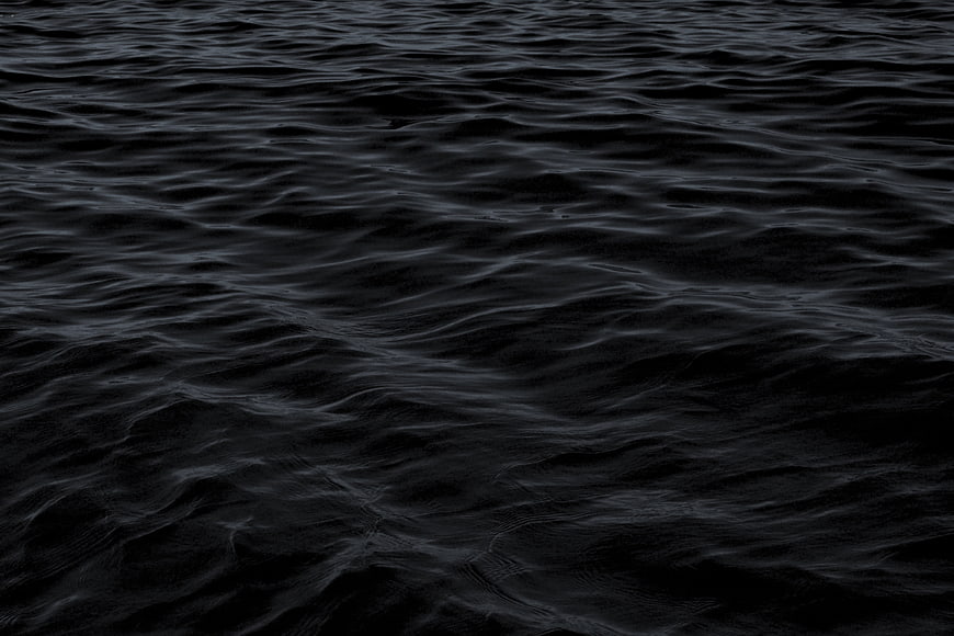 Dark Monochrome Ocean Waves Texture Background