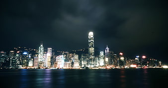 Hong Kong Skyline at Night with Reflections on Water