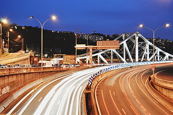 Long Exposure Night Traffic on Urban Highway Bridge